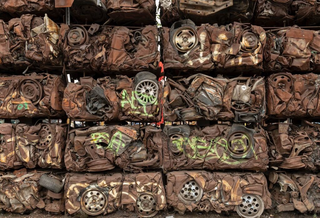 Compacted cars in scrapyard
